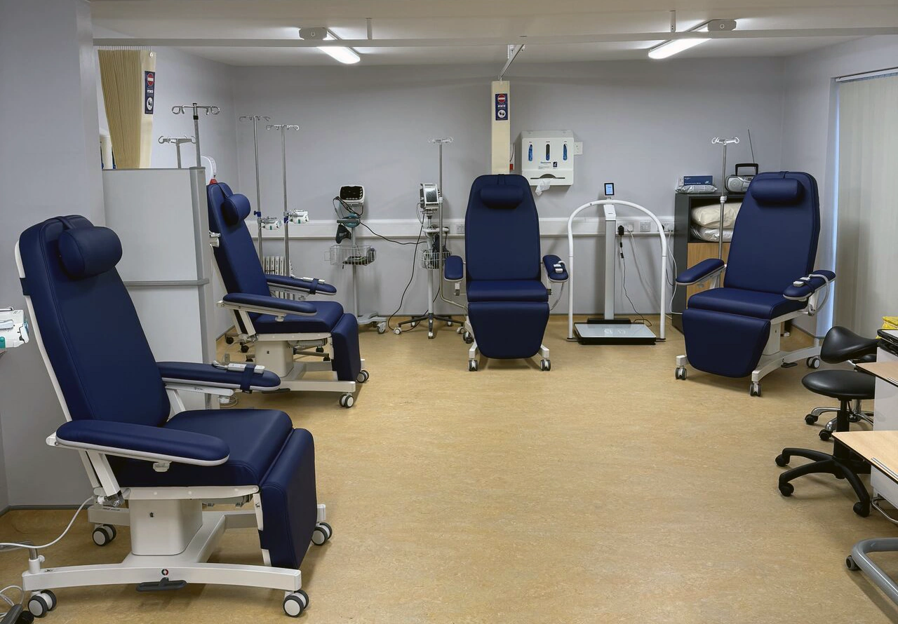 Day care chemotherapy unit with infusion chairs and IV stations